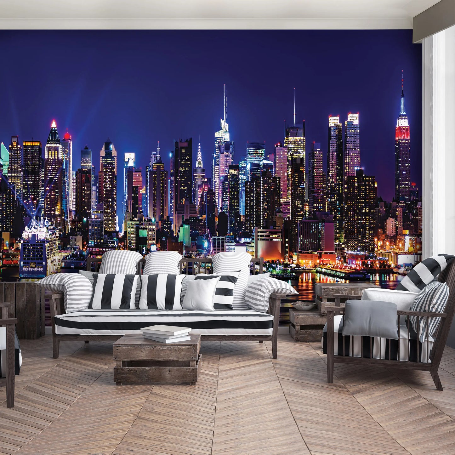Living room with a cityscape wall mural featuring illuminated skyscrapers.