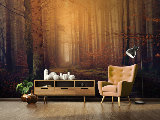 Living room with a forest mural wall, wooden cabinet, and armchair.