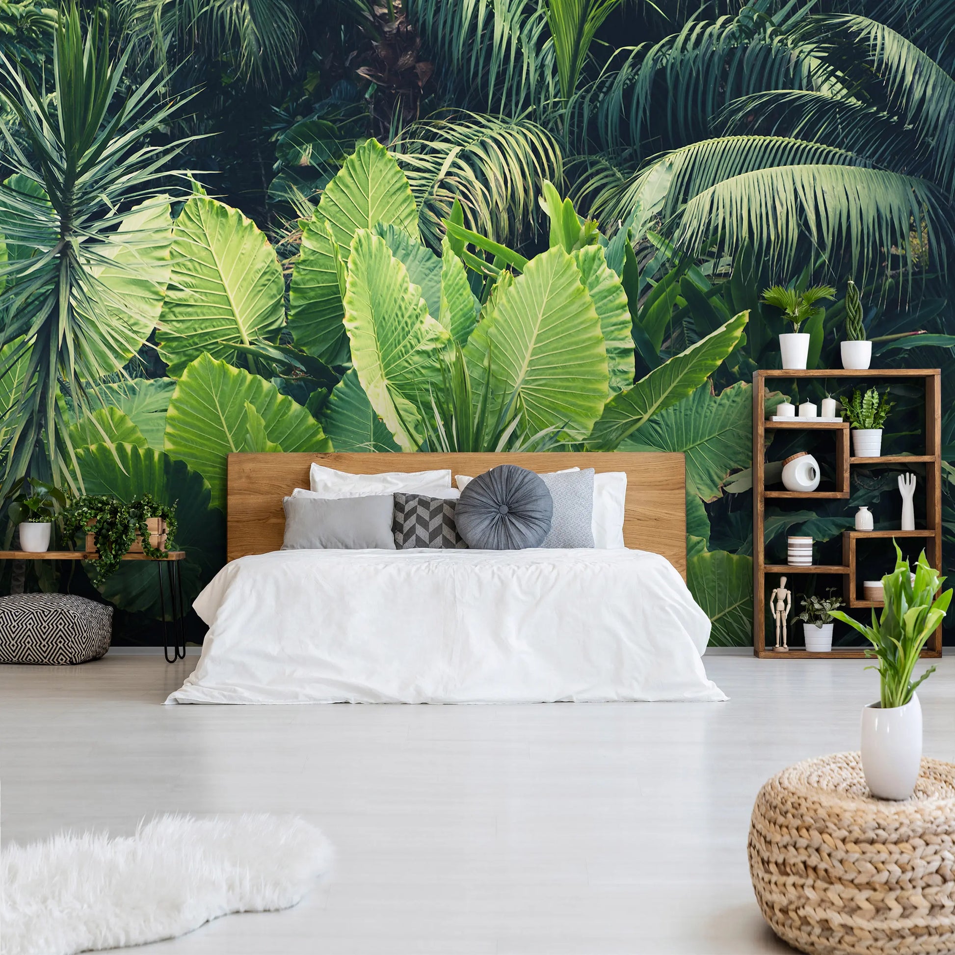Modern bedroom with tropical leaf wallpaper and wooden furniture
