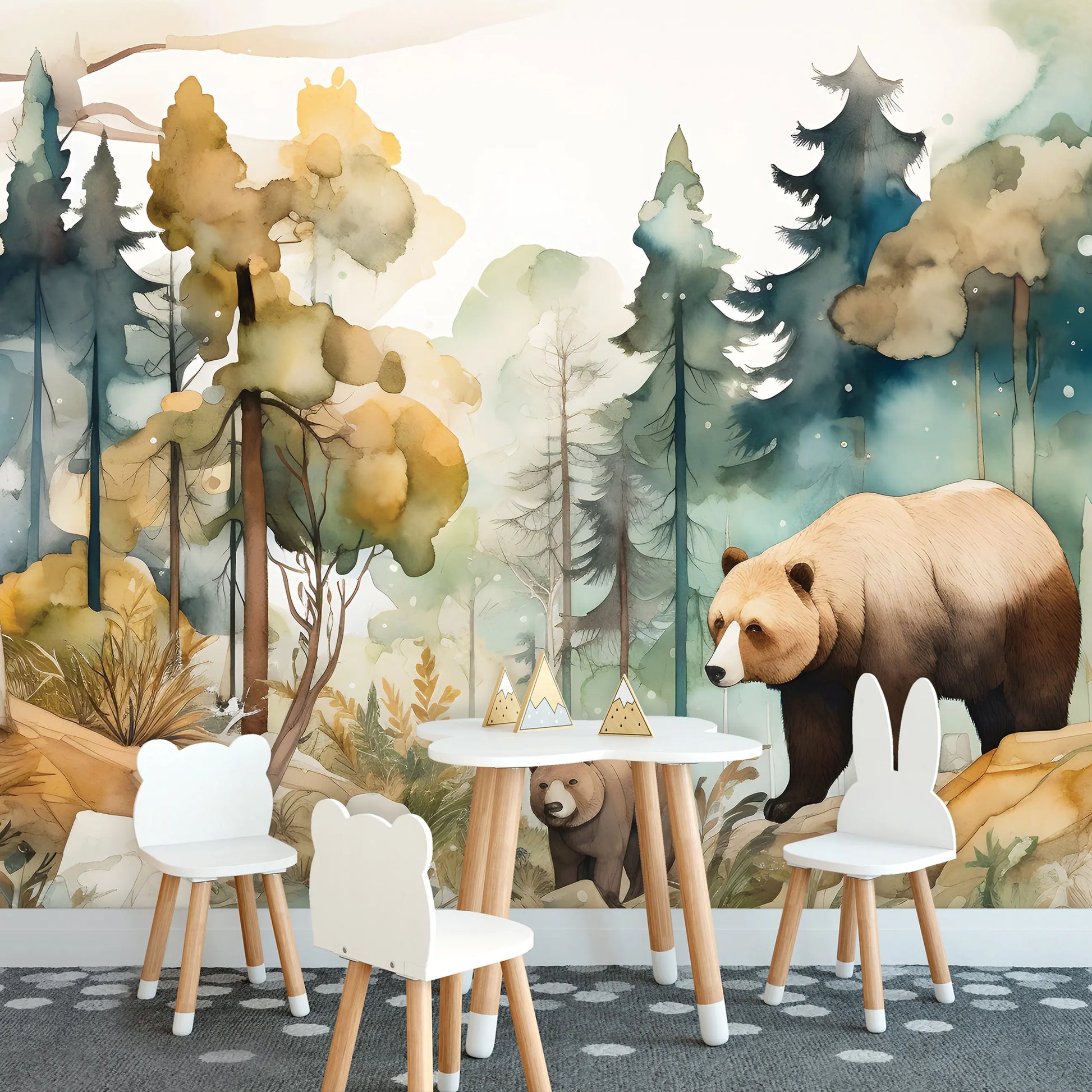 Children's room with forest mural, table, and chairs.