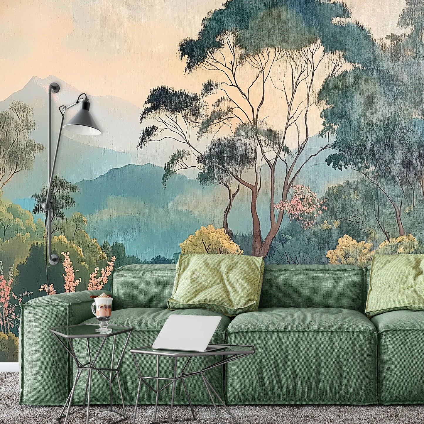 Green sofa with decorative pillows in a room with nature-themed wall mural.