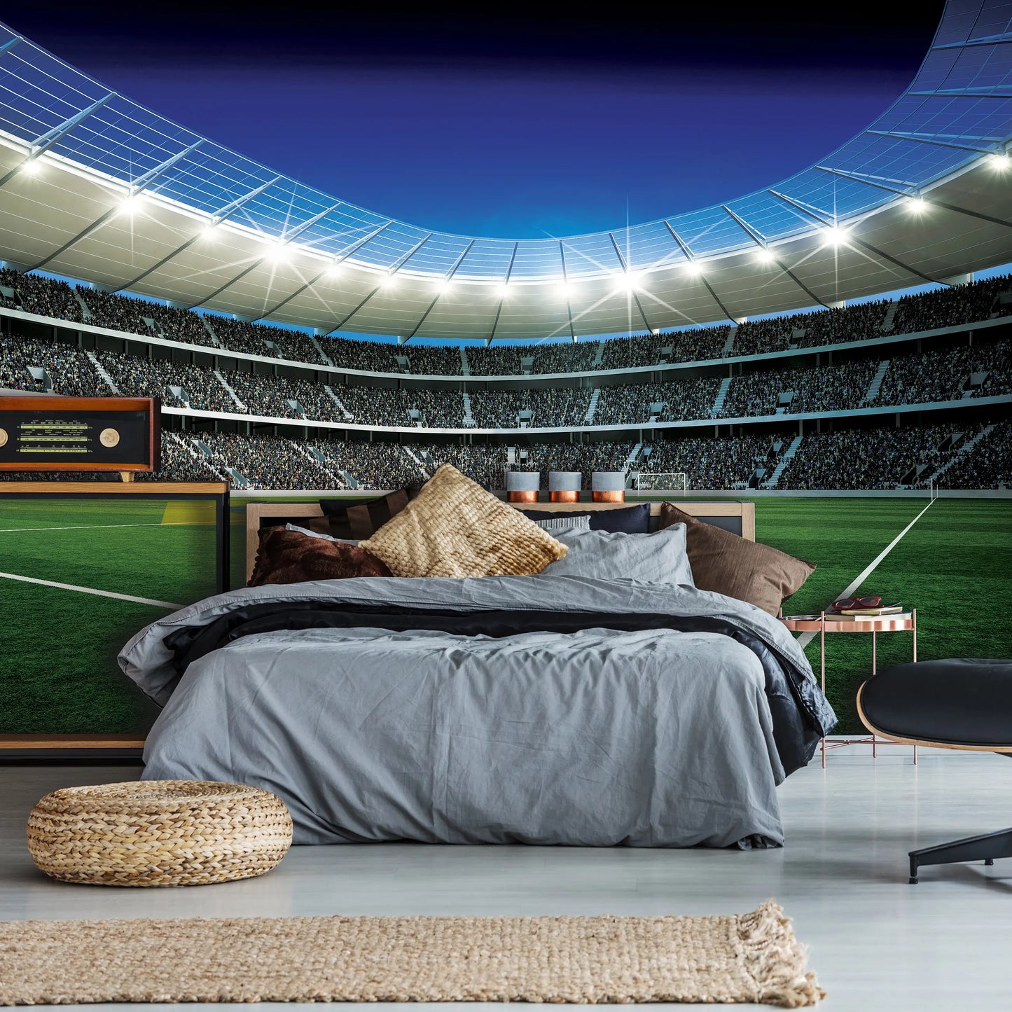 Bedroom with sports stadium mural on the wall