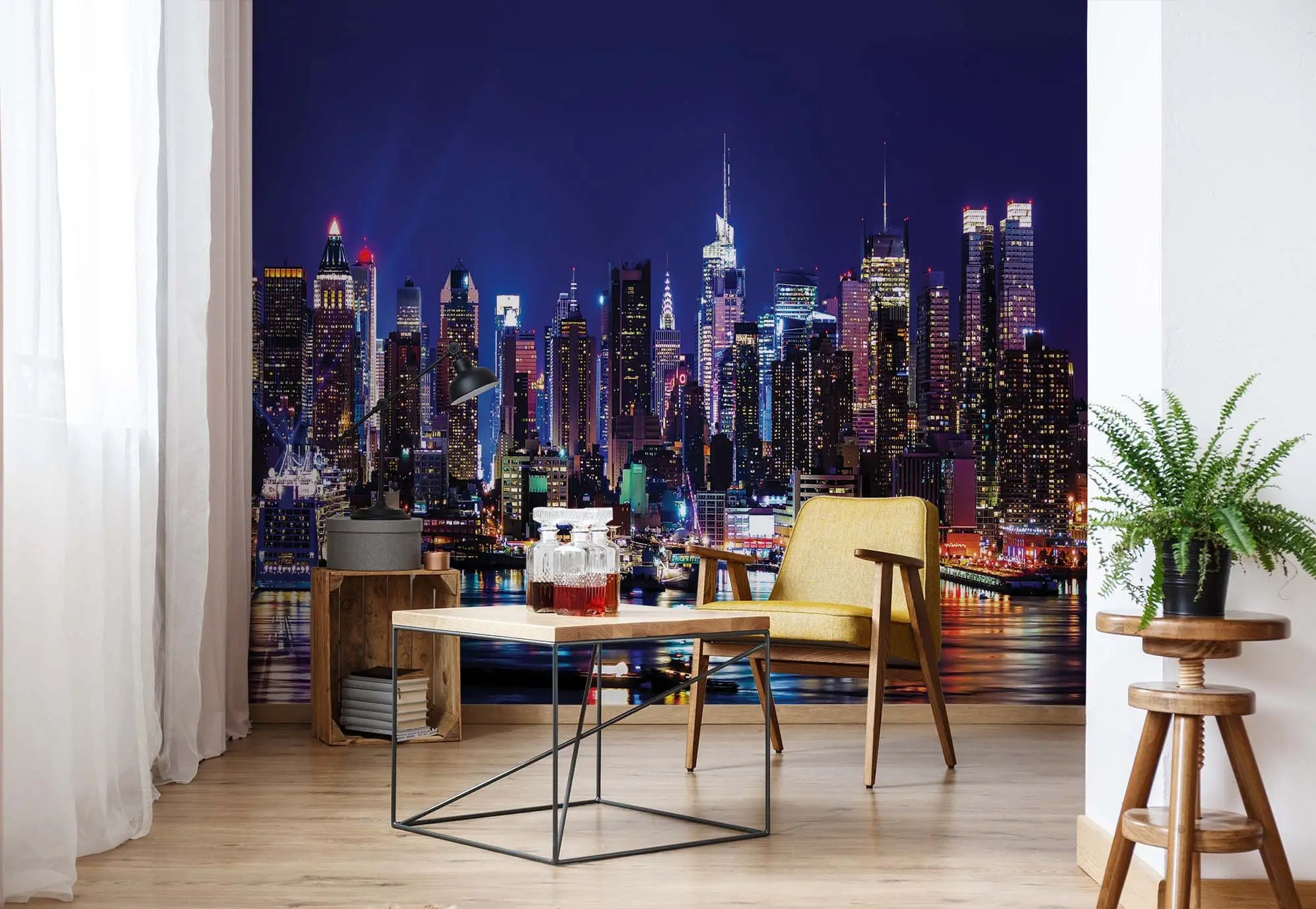 Living room with a city skyline wall mural and modern furniture.