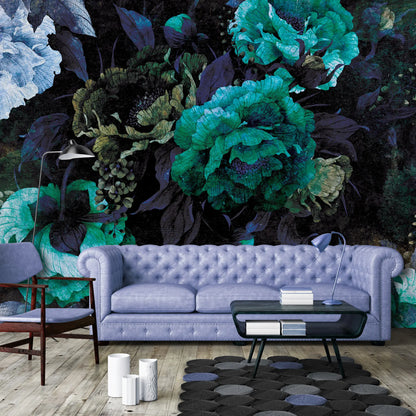 Living room with a purple sofa and decorative floral wall mural.
