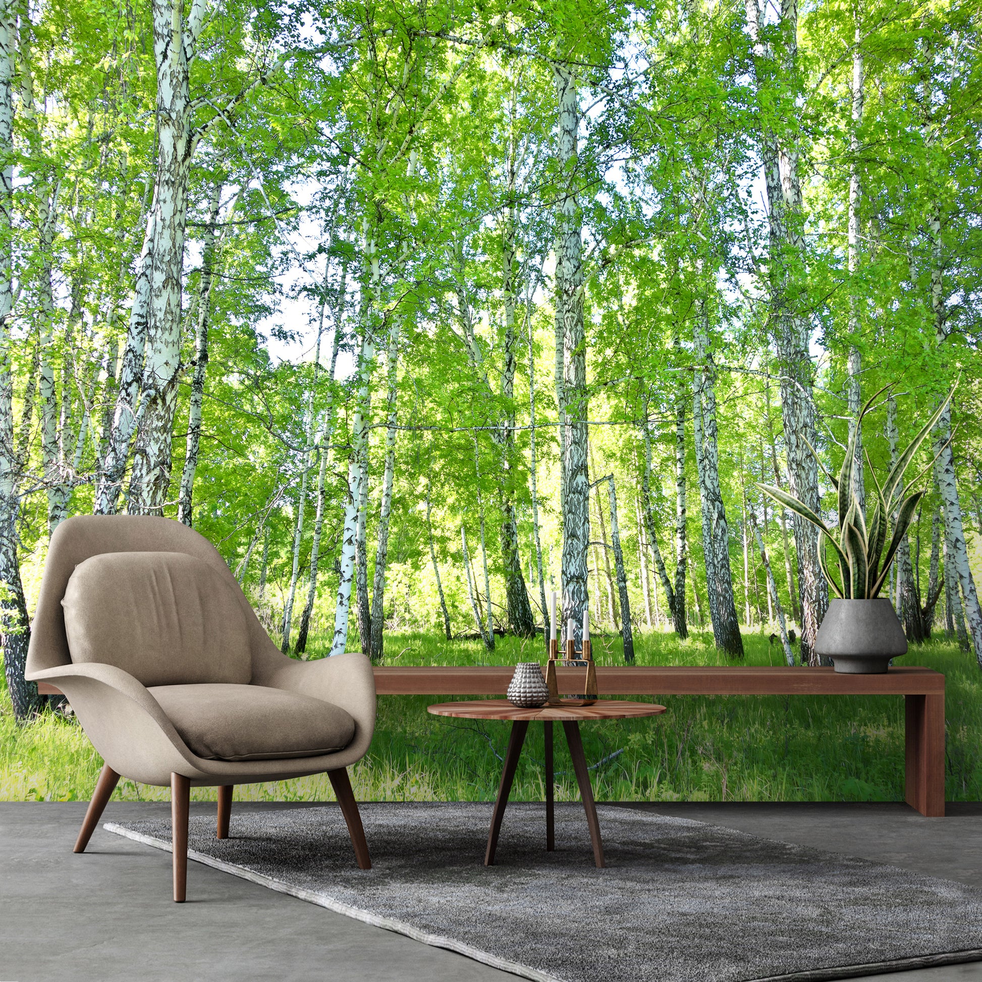 Modern chair and table in a room with a forest wall mural