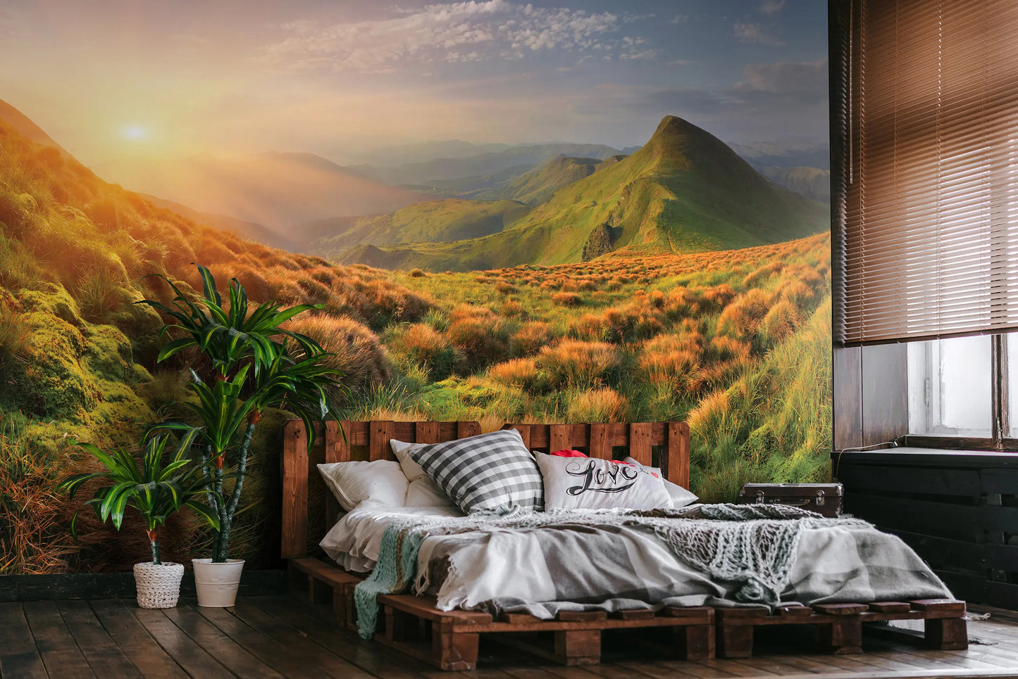 Bedroom with a large wall mural of a mountain landscape.