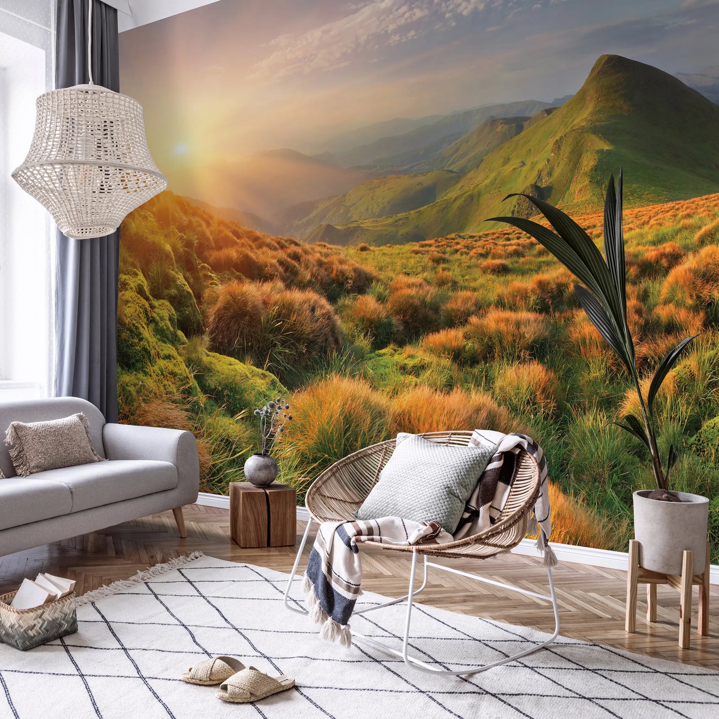 Living room with a large wall mural of a mountain landscape.