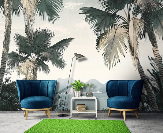 Modern living room with blue chairs, a green rug, and palm tree wall mural.