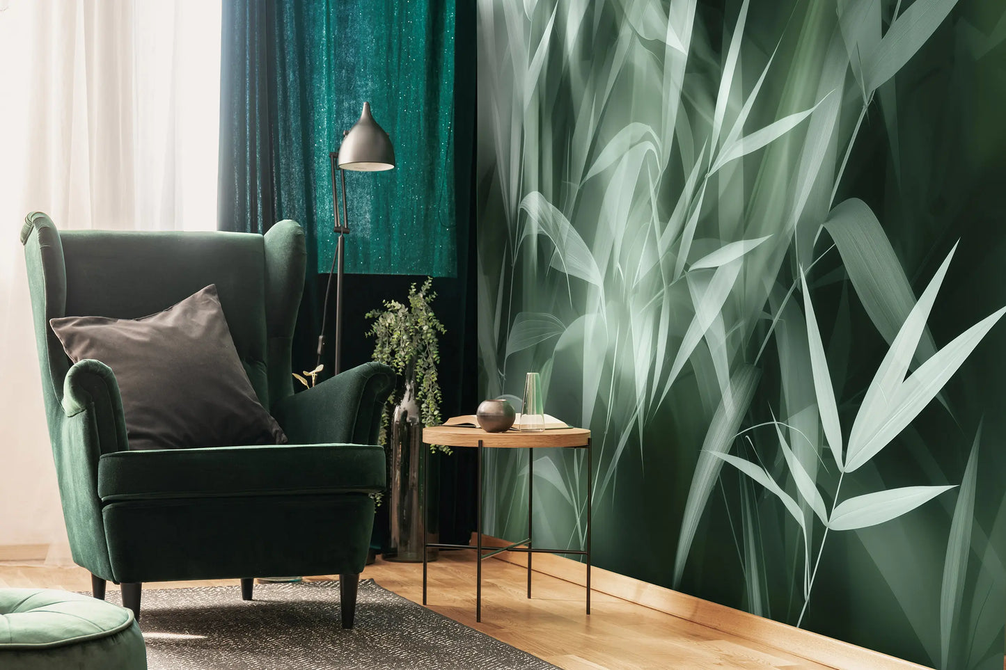 Modern living room with a green armchair, decorative table, and leaf-patterned wall.