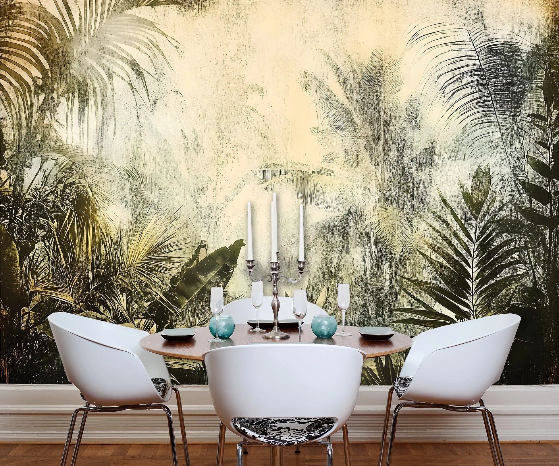 Dining room with tropical leaf wallpaper and a set table.