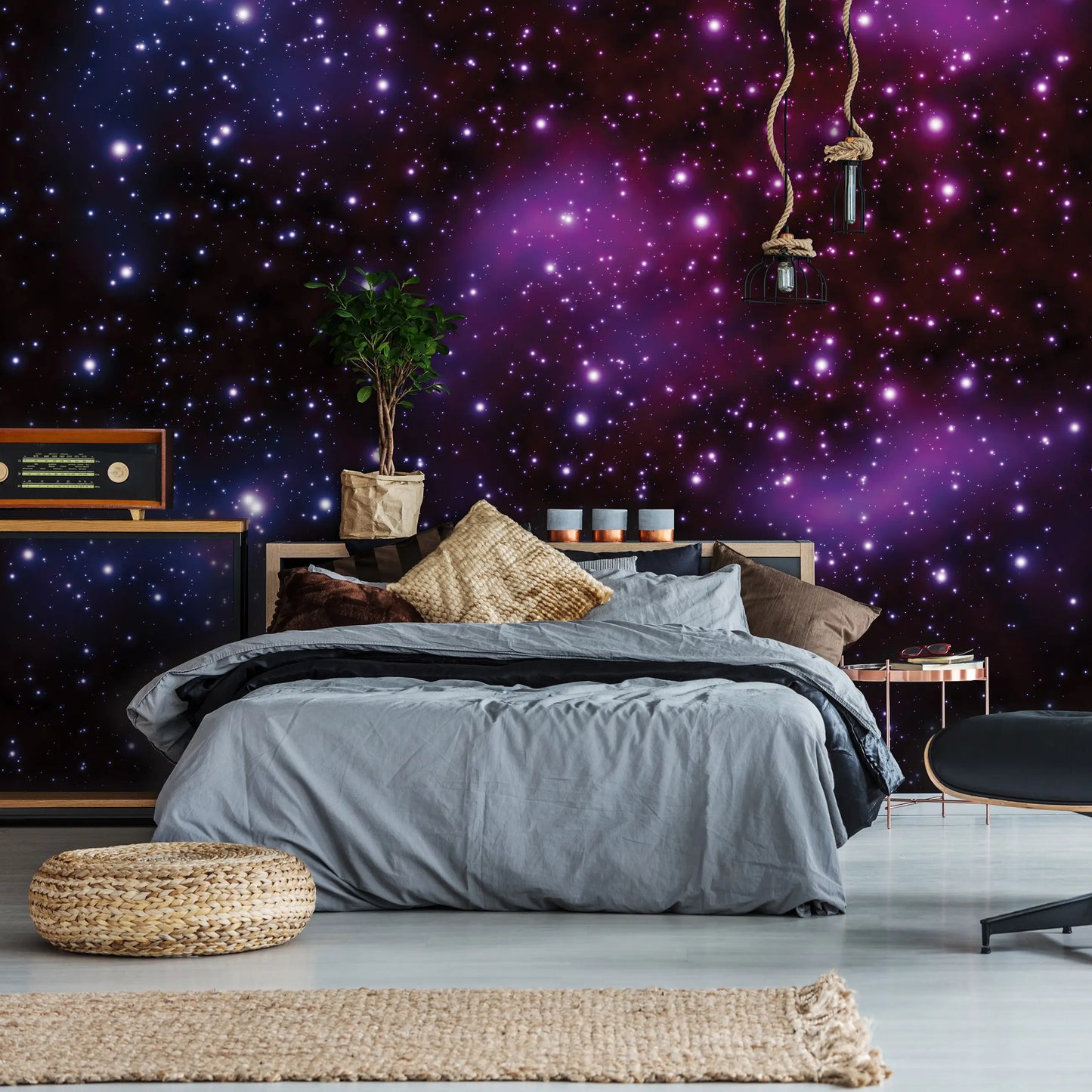 Bedroom with a starry night wall mural