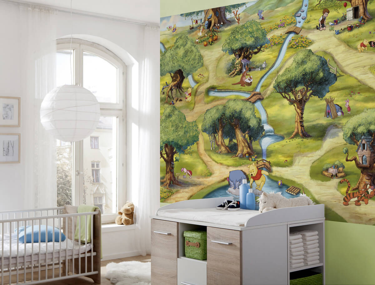 Children's room with a large wall mural of a Winnie The Pooh