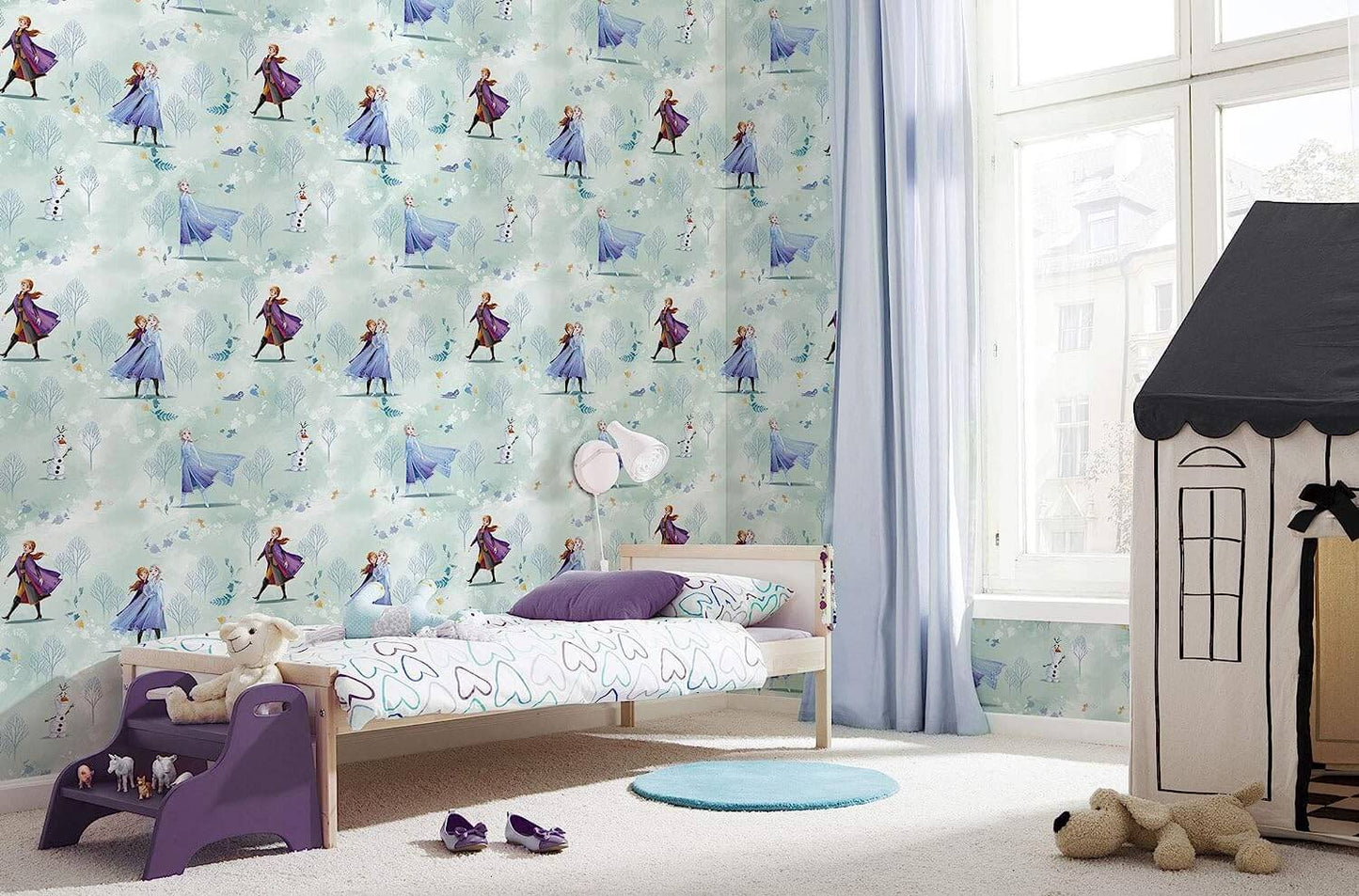 Children's room with Frozen-themed wallpaper