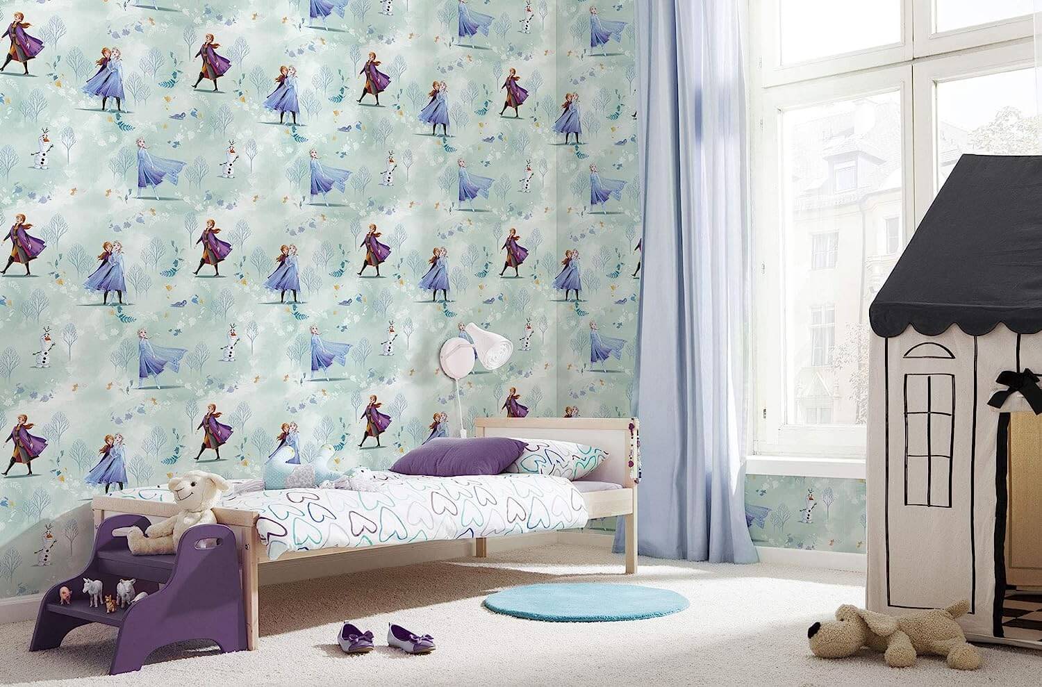 Children's room with Frozen-themed wallpaper